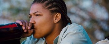 Movie still from “Set It Off” (1996), directed by F. Gary Gray – A person wearing a jacket; Close Up shot, Low angle