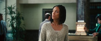 Movie still from “Set It Off” (1996), directed by F. Gary Gray – A woman standing in front of a man; Close Up shot, Low angle