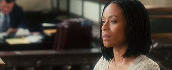 Movie still from “Set It Off” (1996), directed by F. Gary Gray – A person wearing a sweater; Close Up shot, Over the shoulder angle