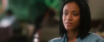 Movie still from “Set It Off” (1996), directed by F. Gary Gray – A person wearing a jean jacket; Close Up shot, Over the shoulder angle