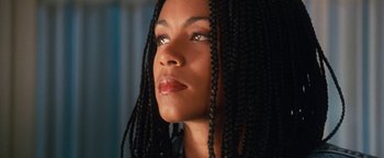 Movie still from “Set It Off” (1996), directed by F. Gary Gray – A person with long braids; Close Up shot, Low angle