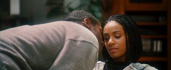 Movie still from “Set It Off” (1996), directed by F. Gary Gray – A man and a woman sitting next to each other; Close Up shot, Over the shoulder angle