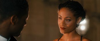 Movie still from “Set It Off” (1996), directed by F. Gary Gray – A person wearing makeup; Close Up shot, Over the shoulder angle