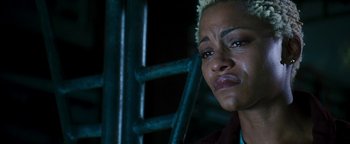 Movie still from “Set It Off” (1996), directed by F. Gary Gray – A person crying with a ladder in the background; Close Up shot, Low angle