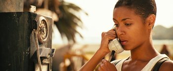 Movie still from “Set It Off” (1996), directed by F. Gary Gray – A woman is talking on a phone outside; Close Up shot, High angle