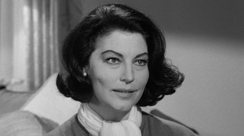 Movie still from “Seven Days in May” (1964), directed by John Frankenheimer – A black and white photo of a woman in a sweater; Close Up shot, Low angle