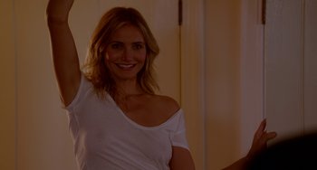 Movie still from “Sex Tape” (2014), directed by Jake Kasdan – A woman in a white shirt raising her arm; Close Up shot, Over the shoulder angle