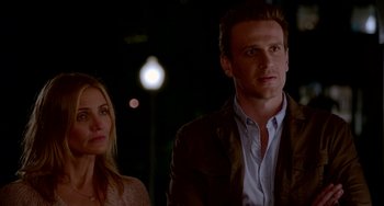 Movie still from “Sex Tape” (2014), directed by Jake Kasdan – A man and a woman standing next to each other in front of a street light; Close Up shot, Over the shoulder angle