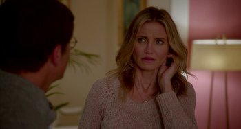 Movie still from “Sex Tape” (2014), directed by Jake Kasdan – A woman in a pink sweater is looking at a man; Close Up shot, Over the shoulder angle