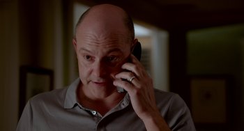 Movie still from “Sex Tape” (2014), directed by Jake Kasdan – A bald man is talking on a cell phone; Close Up shot, Low angle