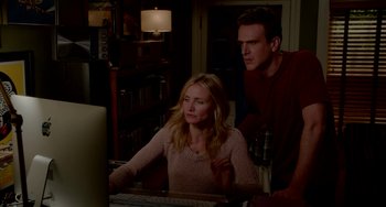 Movie still from “Sex Tape” (2014), directed by Jake Kasdan – A man and a woman looking at a computer screen; Medium shot, Over the shoulder angle