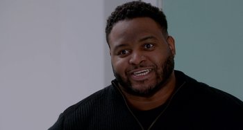 Movie still from “Sex Tape” (2014), directed by Jake Kasdan – A person with a black shirt; Close Up shot, Over the shoulder angle