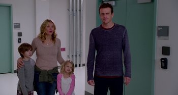 Movie still from “Sex Tape” (2014), directed by Jake Kasdan – A man and a woman and a little girl standing next to each other; Medium shot, Over the shoulder angle