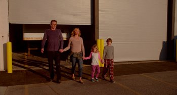 Movie still from “Sex Tape” (2014), directed by Jake Kasdan – A man , woman , and two children are holding hands; Wide shot, Low angle