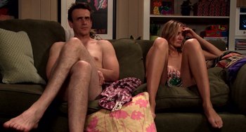 Movie still from “Sex Tape” (2014), directed by Jake Kasdan – A man and a woman sitting on a couch in a living room; Wide shot, High angle