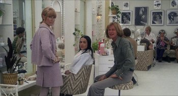 Movie still from “Shampoo” (1975), directed by Hal Ashby – Three women sitting in chairs in front of a mirror; Medium shot, Low angle