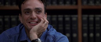 Movie still from “Shattered Glass” (2003), directed by Billy Ray – A person with his hand on his face; Close Up shot, Over the shoulder angle