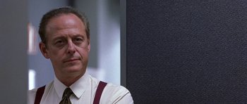 Movie still from “Shattered Glass” (2003), directed by Billy Ray – A person wearing a shirt and tie; Close Up shot, Low angle