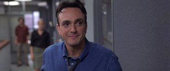 Movie still from “Shattered Glass” (2003), directed by Billy Ray – A person wearing a shirt and a tie; Close Up shot, Over the shoulder angle