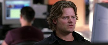 Movie still from “Shattered Glass” (2003), directed by Billy Ray – A person with long hair; Close Up shot, Low angle