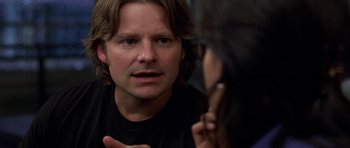 Movie still from “Shattered Glass” (2003), directed by Billy Ray – A man talking to another man in front of a mirror; Close Up shot, Over the shoulder angle