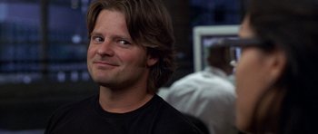 Movie still from “Shattered Glass” (2003), directed by Billy Ray – A person with long hair; Close Up shot, Over the shoulder angle