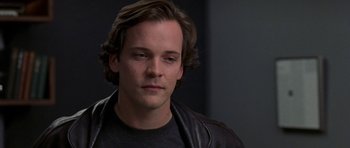 Movie still from “Shattered Glass” (2003), directed by Billy Ray – A person with long hair; Close Up shot, Over the shoulder angle