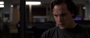 Movie still from “Shattered Glass” (2003), directed by Billy Ray – A person wearing a sweater; Close Up shot, Over the shoulder angle