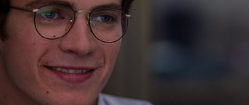 Movie still from “Shattered Glass” (2003), directed by Billy Ray – A person wearing glasses; Extreme Close Up shot, Over the shoulder angle