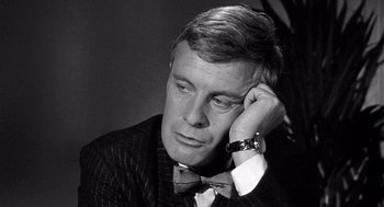 Movie still from “Ship of Fools” (1965), directed by Stanley Kramer – Black and white photograph of a man wearing a bow tie; Close Up shot, Over the shoulder angle