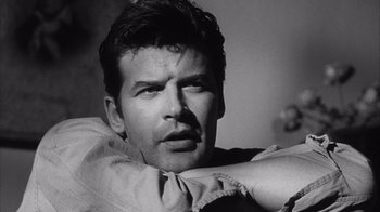 Movie still from “Shock Corridor” (1963), directed by Samuel Fuller – Black and white photograph of a man with a beard; Close Up shot, Low angle