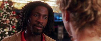 Movie still from “Showgirls” (1995), directed by Paul Verhoeven – A person talking to another person; Close Up shot, Over the shoulder angle