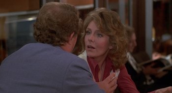 Movie still from “Silver Streak” (1976), directed by Arthur Hiller – An older man and a younger woman in a restaurant setting; Close Up shot, Over the shoulder angle