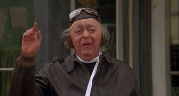 Movie still from “Silver Streak” (1976), directed by Arthur Hiller – An older woman wearing a leather jacket and goggles; Close Up shot, Low angle