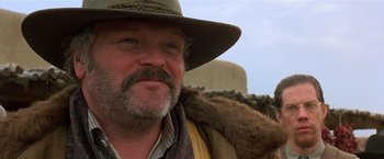 Movie still from “Silverado” (1985), directed by Lawrence Kasdan – A person wearing a hat; Close Up shot, Low angle