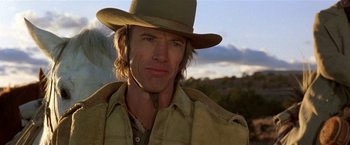 Movie still from “Silverado” (1985), directed by Lawrence Kasdan – A person wearing a hat; Close Up shot, Low angle