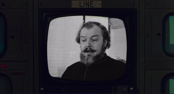 Movie still from “Sisters” (1972), directed by Brian De Palma – A black and white photo of a man with a long beard; Close Up shot, Low angle