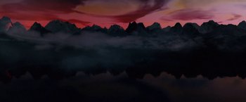 Movie still from “Skin” (2018), directed by Guy Nattiv – A view of a body of water and a mountain range in the background; Extreme Wide shot, Overhead angle