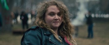 Movie still from “Skin” (2018), directed by Guy Nattiv – A person wearing a jacket; Close Up shot, Over the shoulder angle