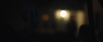 Movie still from “Skin” (2018), directed by Guy Nattiv – A blurry image of the sun in the dark; Extreme Close Up shot, Low angle