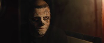 Movie still from “Skin” (2018), directed by Guy Nattiv – A man with a skull face tattoo on his forehead; Close Up shot, Over the shoulder angle