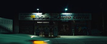Movie still from “Skin” (2018), directed by Guy Nattiv – A truck parked on the side of the road at night; Extreme Wide shot, Low angle