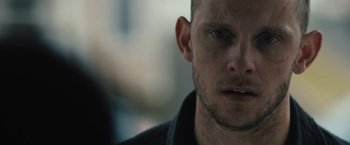 Movie still from “Skin” (2018), directed by Guy Nattiv – A man's face in a black shirt; Close Up shot, Over the shoulder angle