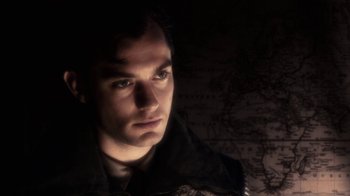 Movie still from “Sky Captain and the World of Tomorrow” (2004), directed by Kerry Conran – A person looking at the camera; Close Up shot, Over the shoulder angle