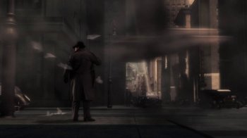 Movie still from “Sky Captain and the World of Tomorrow” (2004), directed by Kerry Conran – A man standing on the sidewalk in the dark; Wide shot, Low angle