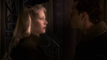 Movie still from “Sky Captain and the World of Tomorrow” (2004), directed by Kerry Conran – A man and a woman looking at one another; Close Up shot, Over the shoulder angle