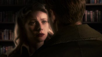 Movie still from “Sky Captain and the World of Tomorrow” (2004), directed by Kerry Conran – A man and a woman looking into each other's eyes; Close Up shot, Over the shoulder angle