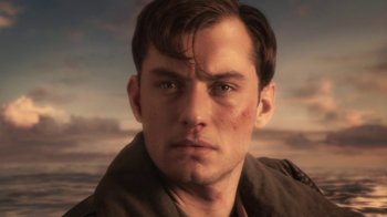 Movie still from “Sky Captain and the World of Tomorrow” (2004), directed by Kerry Conran – A man's face in a scene; Close Up shot, Low angle
