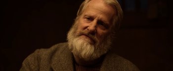 Movie still from “Godless” (2017), directed by Scott Frank – An old man with a beard and a white mustache; Close Up shot, Over the shoulder angle