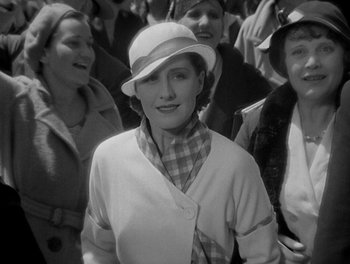 Movie still from “Smilin' Through” (1932), directed by Sidney Franklin – A group of women standing next to each other; Medium shot, High angle